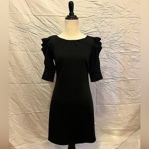 Jessica Simpson, black, jersey cocktail dress w/ dramatic sleeves. Sz 2.
